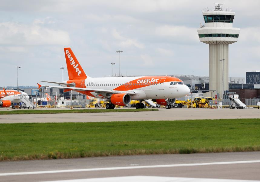 An Easyjet Airbus aircraft taxis close to the northern runway at Gatwick Airport in Crawley, Britain, August 25, 2021.  REUTERS/Peter Nicholls