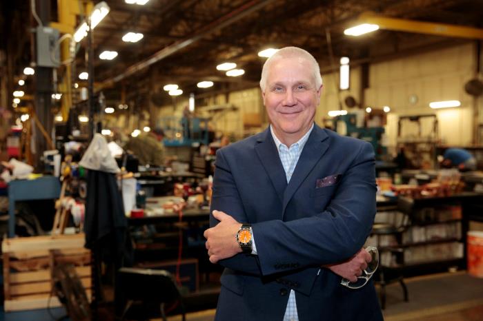Bob Roth, CEO of transformer manufacturer RoMan Manufacturing poses for a photograph in his plant in Grand Rapids, Michigan, U.S. December 12, 2018.   REUTERS/Rebecca Cook/File Photo