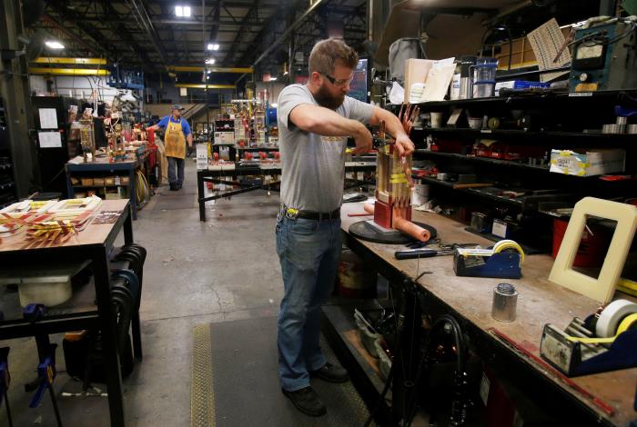 Sub-assembly worker Joel Dykema works on the sub-assembly of a transformer in the RoMan Manufacturing plant in Grand Rapids, Michigan, U.S. December 12, 2018.    REUTERS/Rebecca Cook