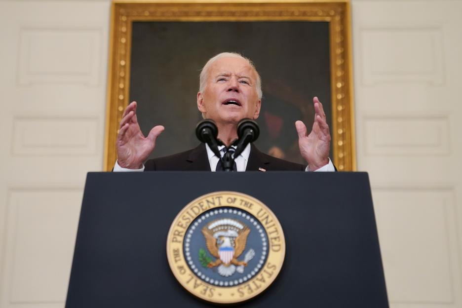 U.S. President Joe Biden delivers remarks on the Delta variant and his administration's efforts to increase vaccinations, from the State Dining Room of the White House in Washington, U.S., September 9, 2021. REUTERS/Kevin Lamarque