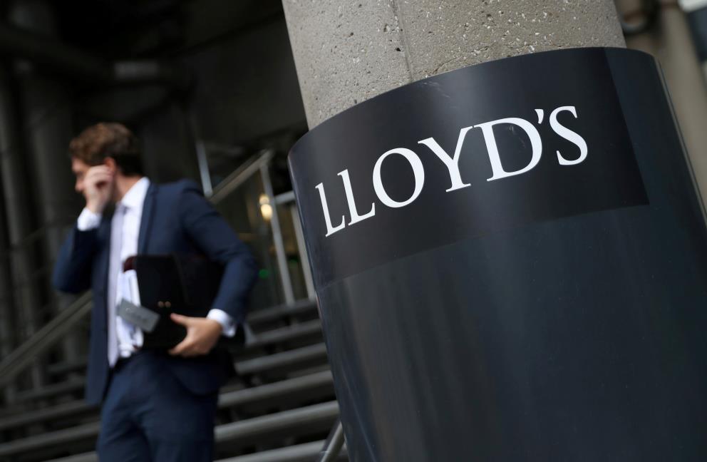 A man walks out of Lloyd's of London's headquarters in the City of London, Britain, July 31, 2018. REUTERS/Simon Dawson