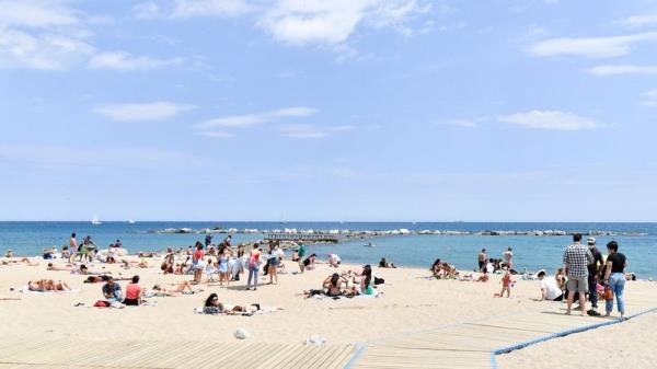 Barcelo<em></em>neta Beach in Barcelona: overtourism in cities like Barcelona has generated a backlash. Photo: Pau Barrena/AFP via Getty Images